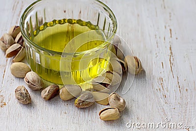 Pistachio oil with nuts. Stock Photo