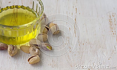 Pistachio oil with nuts. Stock Photo