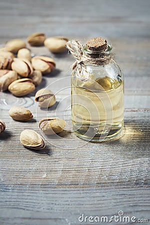 Pistachio oil with nuts. Stock Photo