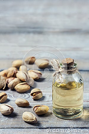 Pistachio oil with nuts. Stock Photo