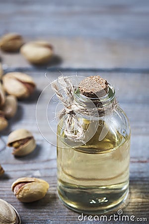 Pistachio oil with nuts. Stock Photo