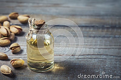 Pistachio oil with nuts. Stock Photo