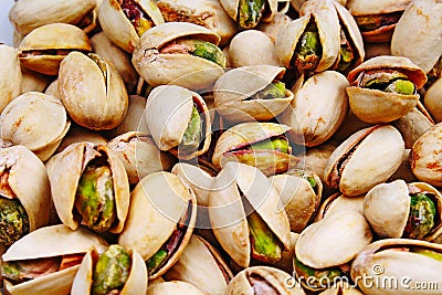 Pistachio texture. Nuts. Green fresh pistachios as texture. Roasted salted pistachio nuts healthy delicious food studio Stock Photo