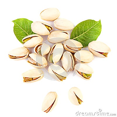 Pistachios isolated on white background. Pistachio and green leaves Stock Photo