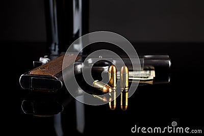 Pistol 1911 with ammunition on black Stock Photo