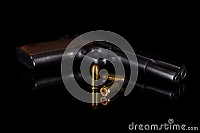 Pistol 1911 with ammunition on black Stock Photo