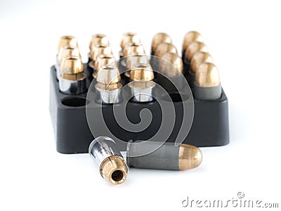 .45 Pistol bullets in a cartridge holder. Stock Photo