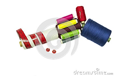 Pistol gun from sewing spools with red buttons Stock Photo