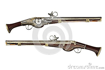 Pistols pair original antique wheelock and flint pistols Stock Photo
