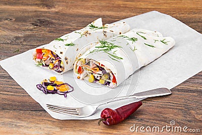 Pita bread with chicken and vegetables Stock Photo