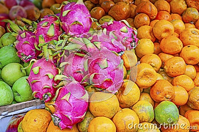 Pitaya, oranges and apples in market in Kerala Stock Photo