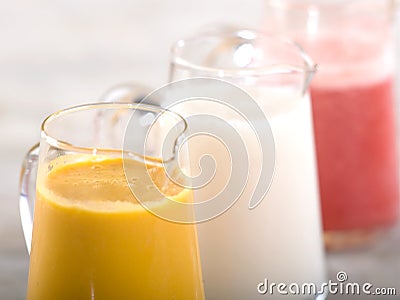 Pitchers of fresh fruit smoothies Stock Photo