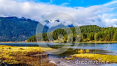 Pitt Lake with the Snow Capped Peaks of the Coast Mountain Range in the Fraser Valley of British Columbia Stock Photo