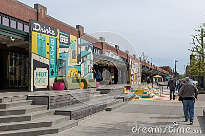 Pittsburgh, Pennsylvania, USA April 30, 2022 People walking along Smallman Street in front of the Terminal in the Strip District Editorial Stock Photo