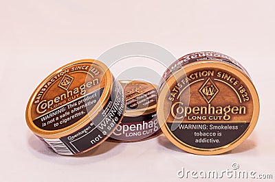 Pittsburgh, Pennsylvania, USA 2-5-21 Three cans of Copenhagen Long Cut smokeless snuff tobacco Editorial Stock Photo