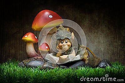 Reading pixie fantasy background Stock Photo