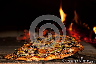 Pizza in the wood oven! Stock Photo