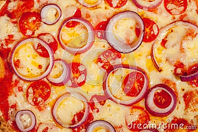 Pizza background. Close-up of melted cheese red onion and tomato Stock Photo