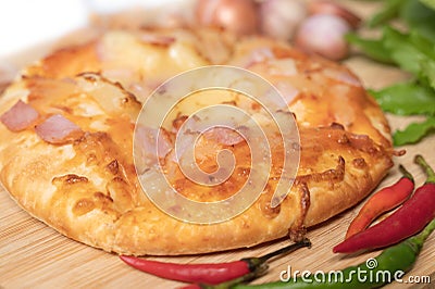 Pizza background in fast food close up with fresh paprika, garlic, shallots Stock Photo