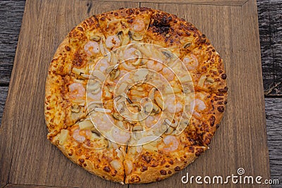 Pizza background image placed on a wooden floor Stock Photo
