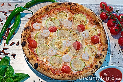 Pizza baked over a wood fire Stock Photo