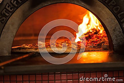 Pizza baking Stock Photo