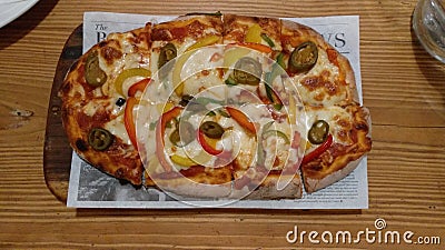 Pizza with bell pepper alpino with lots of cheese Stock Photo