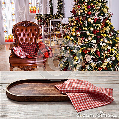 Pizza board, with napkin on wooden table. Top view mockup. Festive sparkling Christmas interiors background Stock Photo
