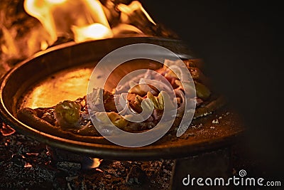 Pizza in a bread wood fired oven Stock Photo