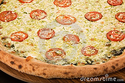Pizza Caprese with basil Stock Photo