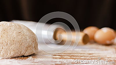 Pizza dough on the table with more products to make the pizza Stock Photo