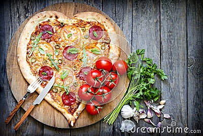 Pizza heart shape with cheese and tomato Stock Photo