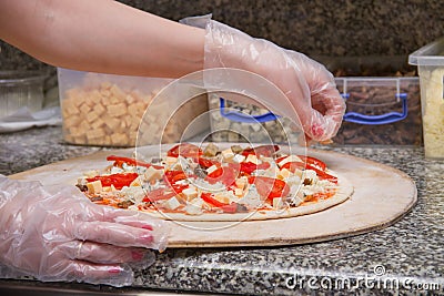 Pizza making, Italian pizza, ingredients, baked, hot flavored Stock Photo