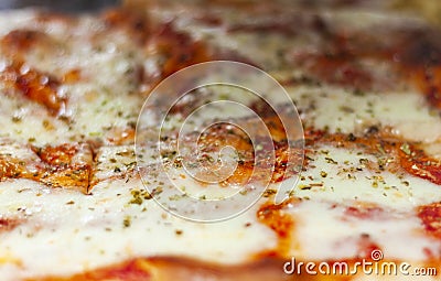 Pizza Margherita with tomatoes, mozzarella fior di latte, fresh basil, salt and extra-virgin olive oil Stock Photo