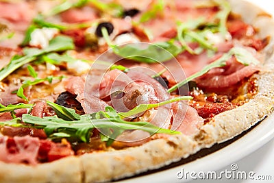 Pizza with parma ham and artichoke Stock Photo