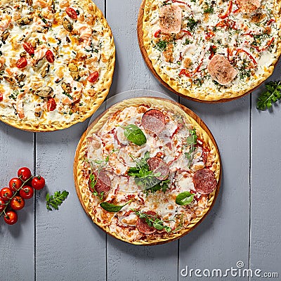 Pizzas on wooden boards top view Stock Photo