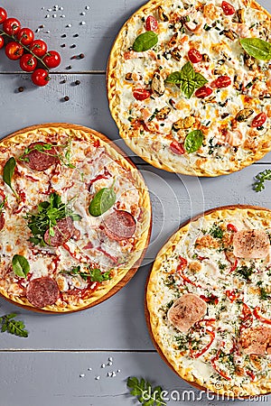 Pizzas on wooden boards top view Stock Photo