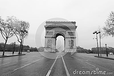 Place Charles de Gaulles Arc de Triomphe being empty during the lockdown in Paris coronavirus COVID-19. Stock Photo