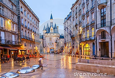 Place du Palais in Bordeaux, with the Cailhau gate at dusk. Stock Photo