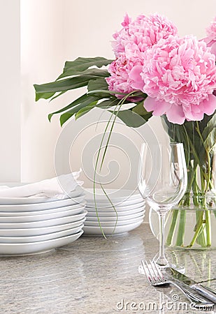 Place setting & white dishes, peonies Stock Photo
