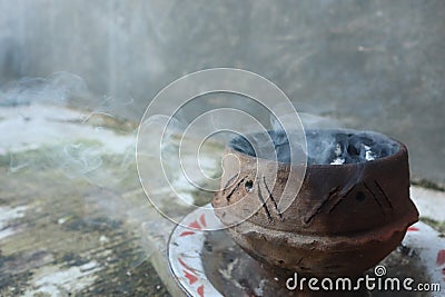 a place to burn incense made of clay and produce a pungent-scented smoke Stock Photo