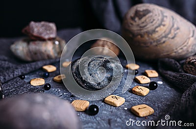 Place for your product on stone on a witch& x27;s table in a dark atmosphere. Mockup. Stock Photo