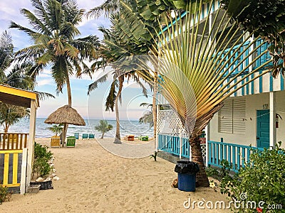 Placencia, Belize - May 26th, 2018: Beautiful sandy beach with a Editorial Stock Photo