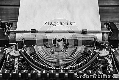 Plagiarism, copyright written. Close it. printed on a sheet of paper. Stock Photo