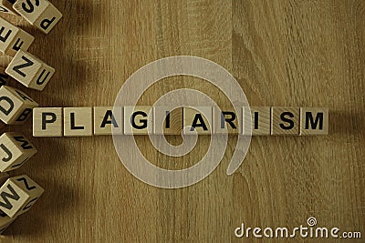 Plagiarism word from wooden blocks Stock Photo