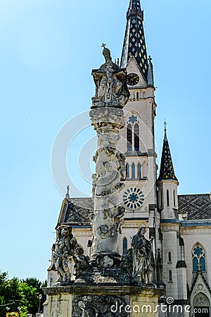 Plague column statue in front of the Sacred heart church in Koszeg Stock Photo