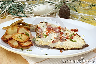 Plaice with fried potato and organic beans Stock Photo