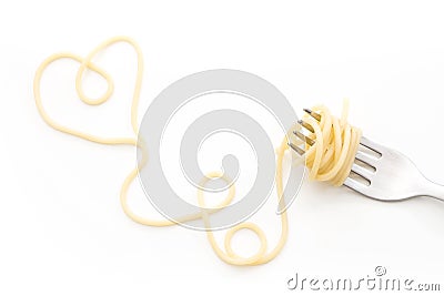 Plain cooked spaghetti pasta on fork with heart shape, on white background. Stock Photo