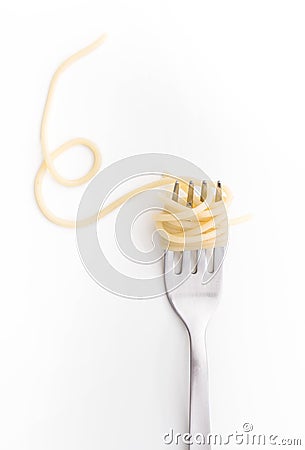 Plain cooked spaghetti pasta on fork, on white background. Stock Photo