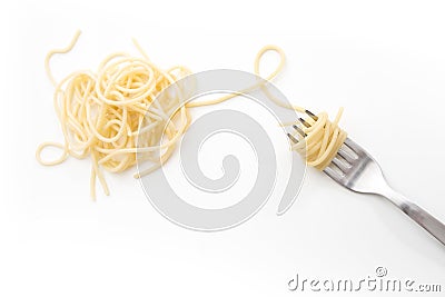 Plain cooked spaghetti pasta on fork, on white background. Stock Photo